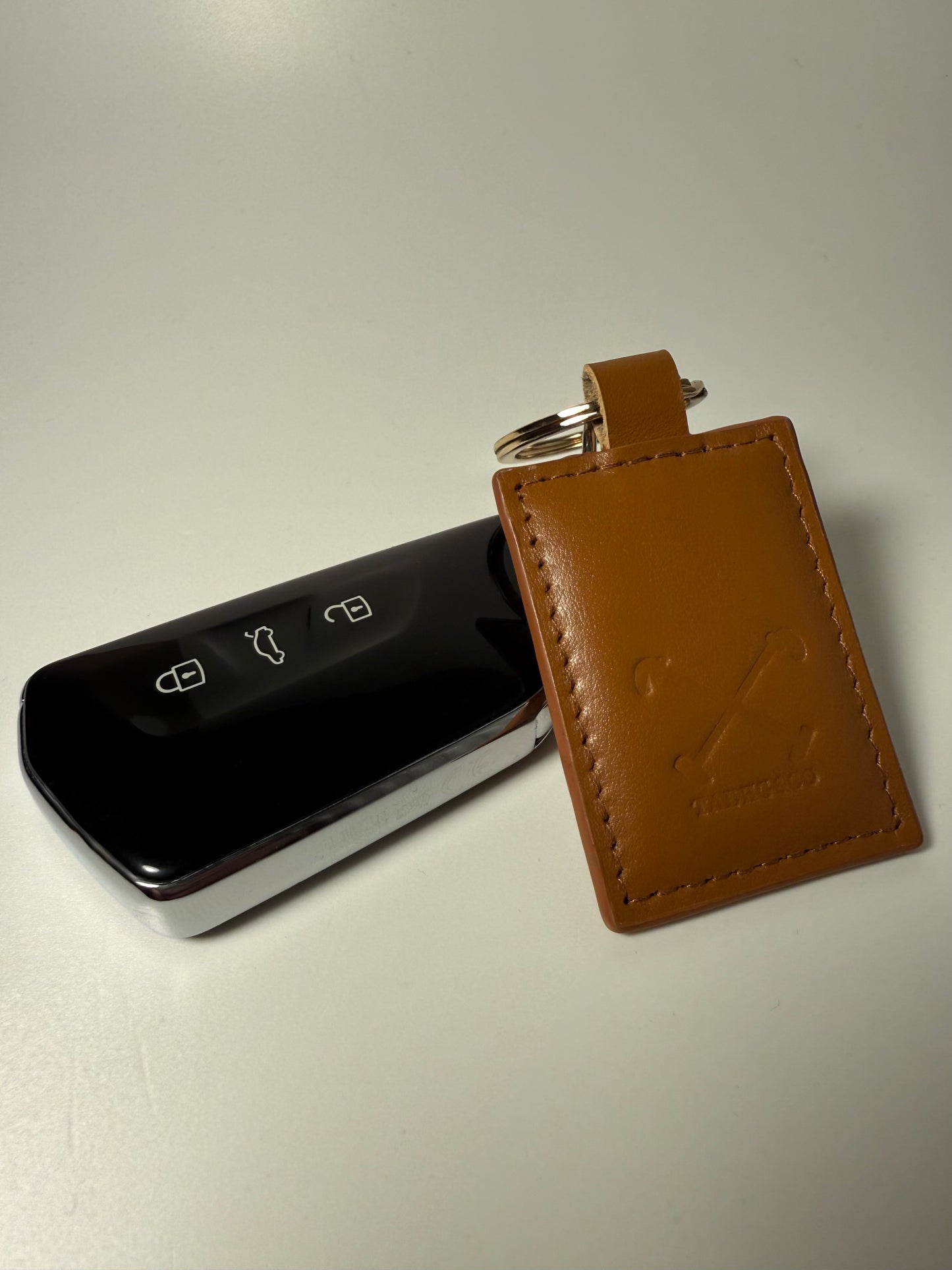 Tadhg & Co tan leather key ring with durable metal hardware for everyday use with car keys.