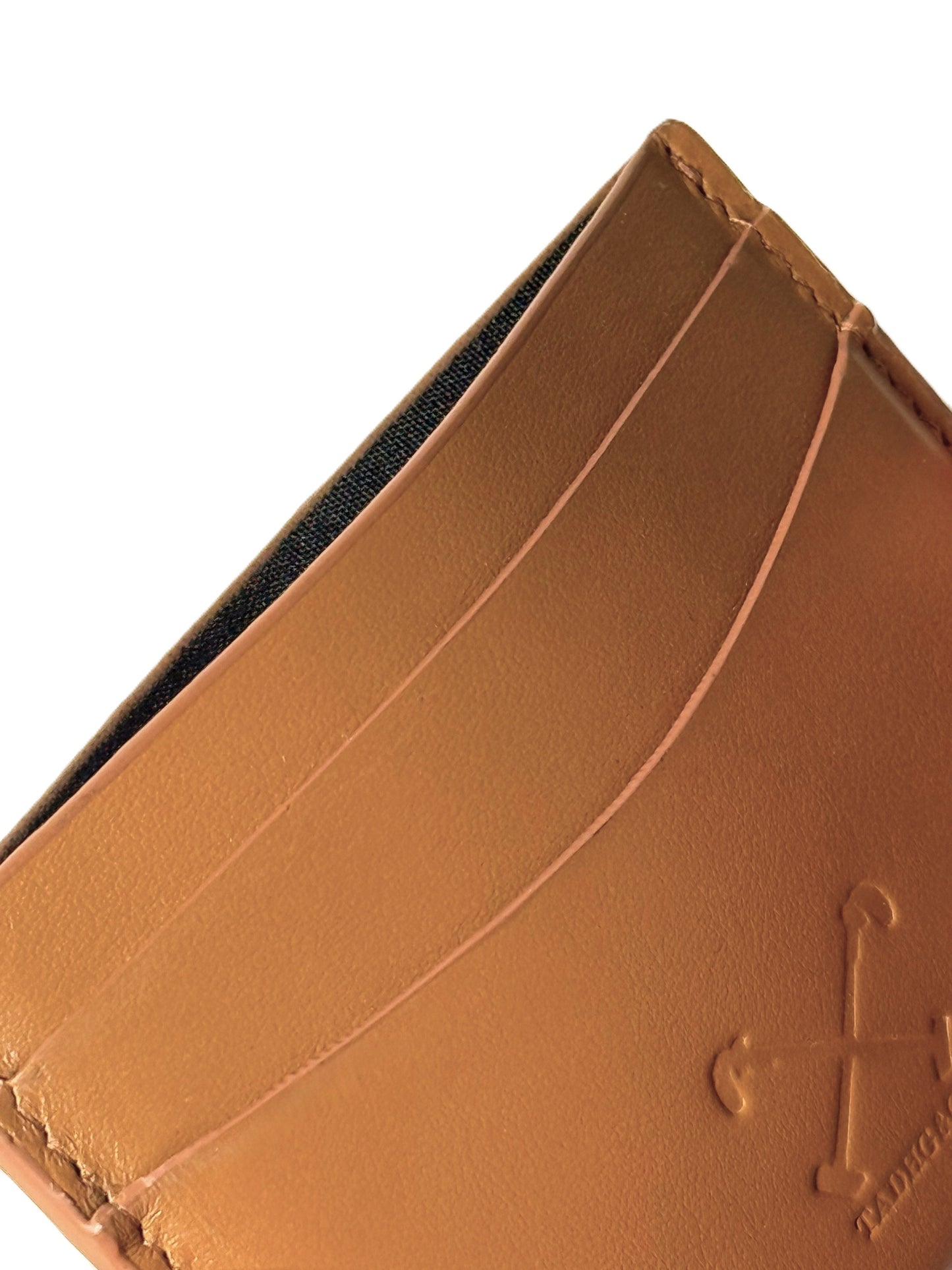 Close up of Tadhg & Co British tan leather cardholder made from premium leather with a slim, minimalist design.