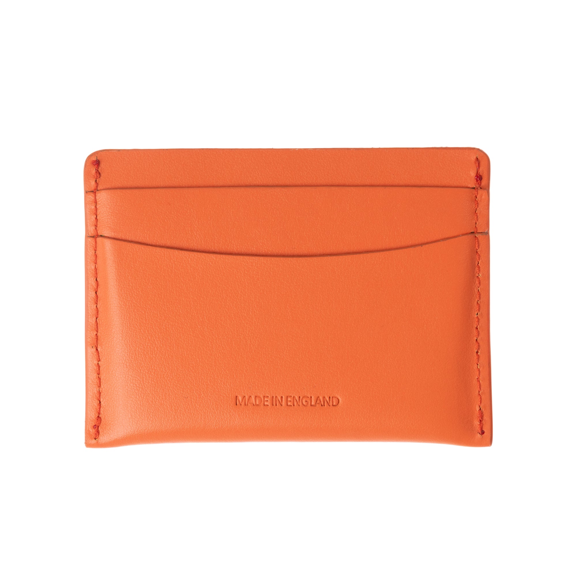 Handmade in orange card holder, made from top grain Italian leather with equestrian polo themed logo - front side. 