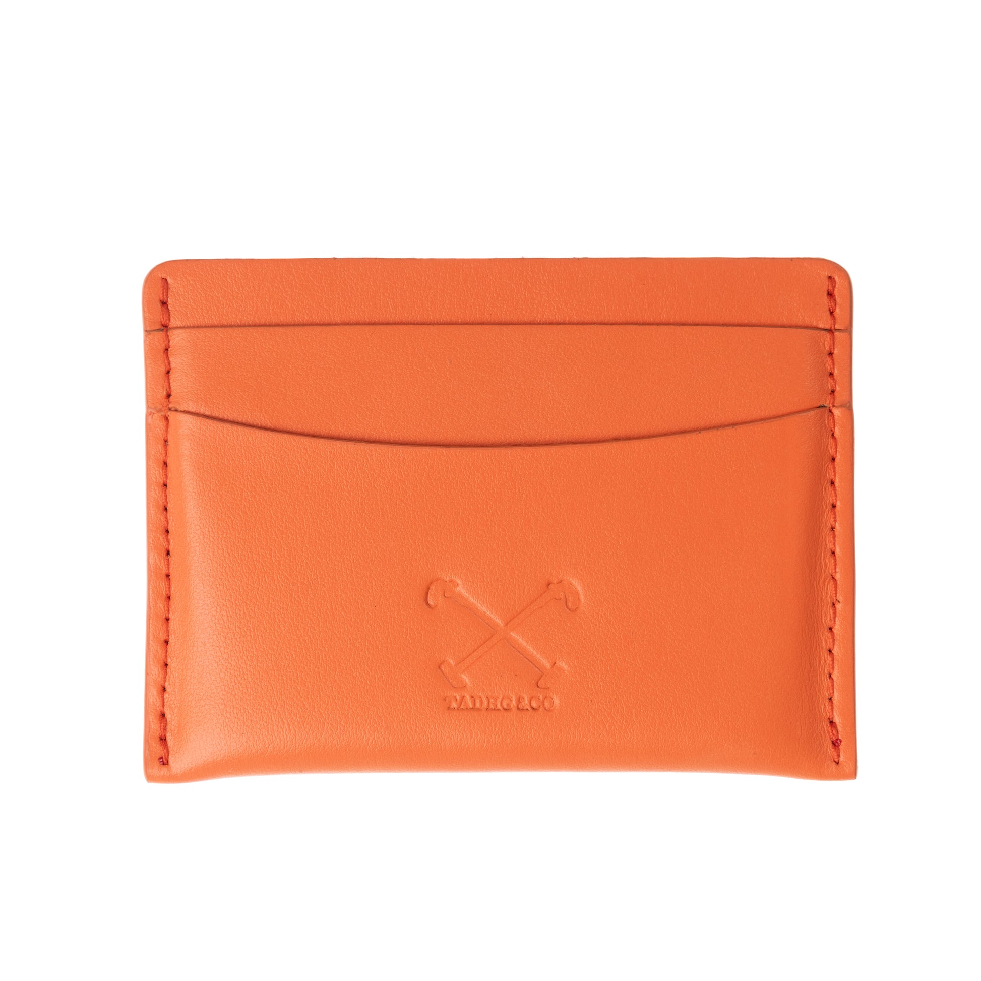 Handmade in orange card holder, made from top grain Italian leather with equestrian polo themed logo - front side. 